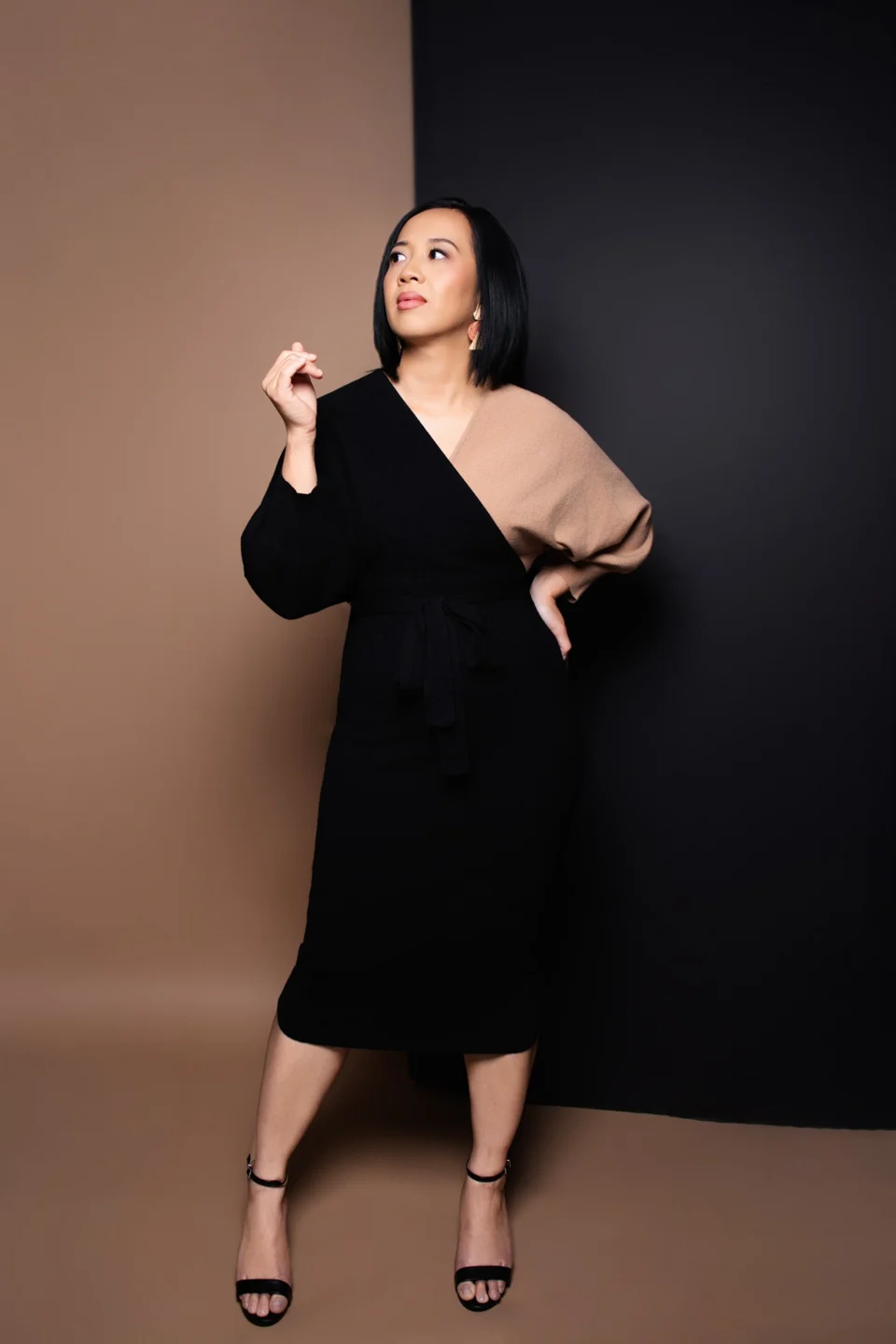 Studio portrait in an elegant black dress